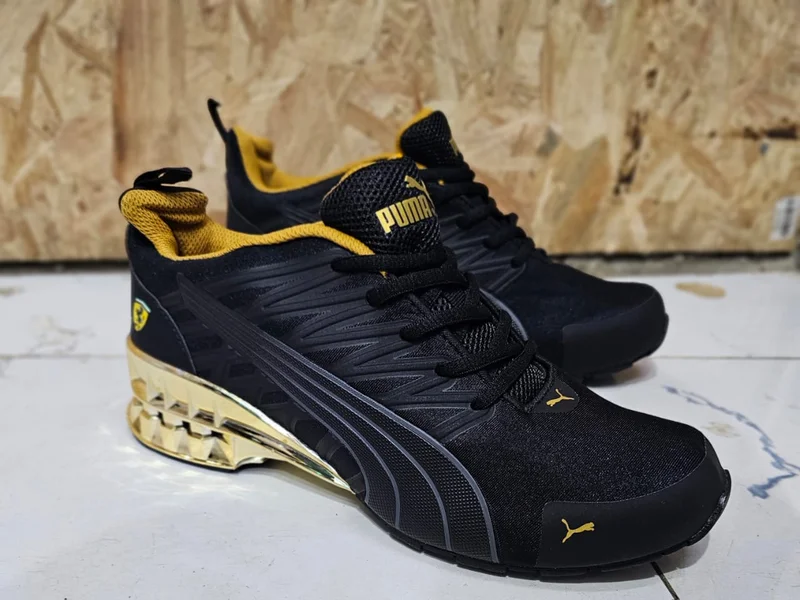 black-gold_puma_ferrari_running_shoes_2.webp