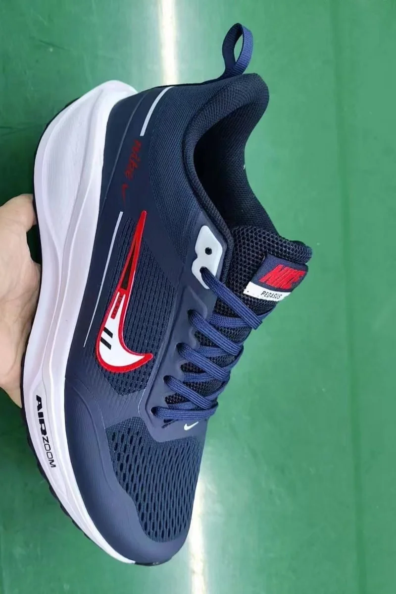 blue_nike_air_zoom_pegasus_sneaker-_white_sole_2.webp
