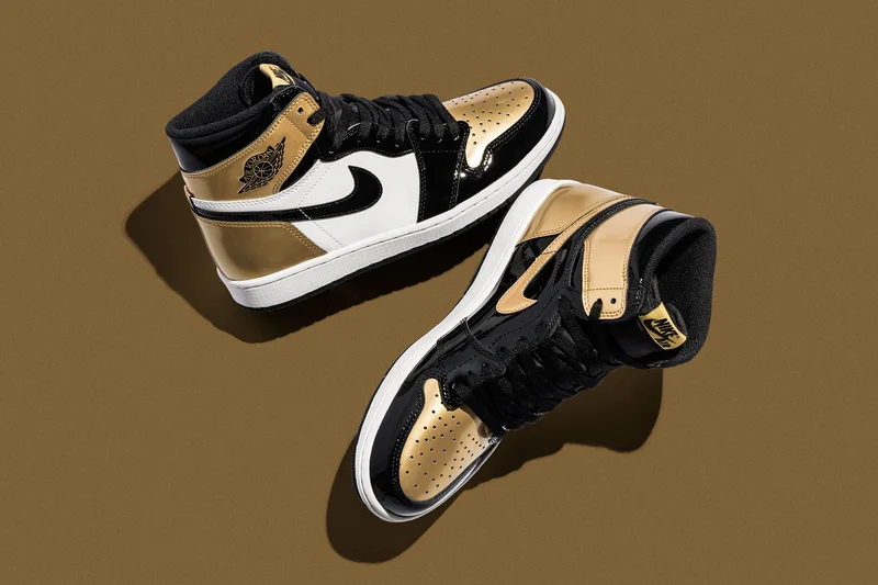 jordan_1_retro_high_nrg_patent_gold_toe_2.webp