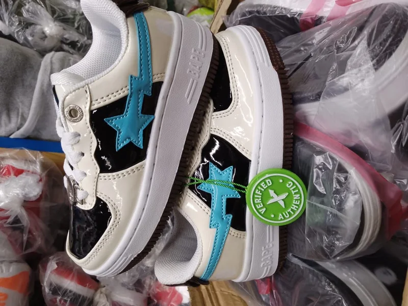 a_bathing_ape_bape_sta_x_marvel_'cream_black_blue'_2.webp