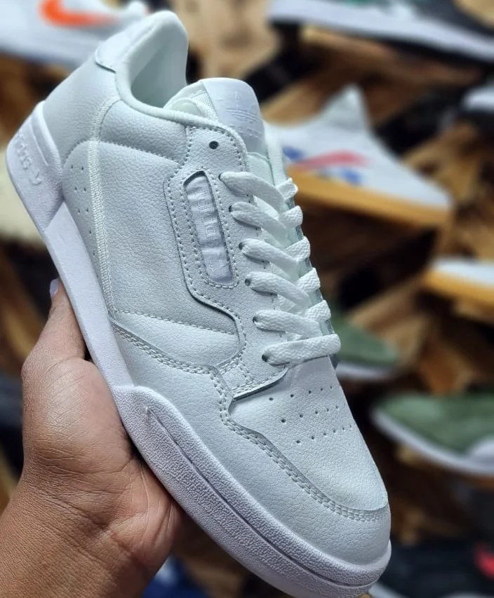 adidas_sports_men_and_women_white_sneakers_shoes_2.webp