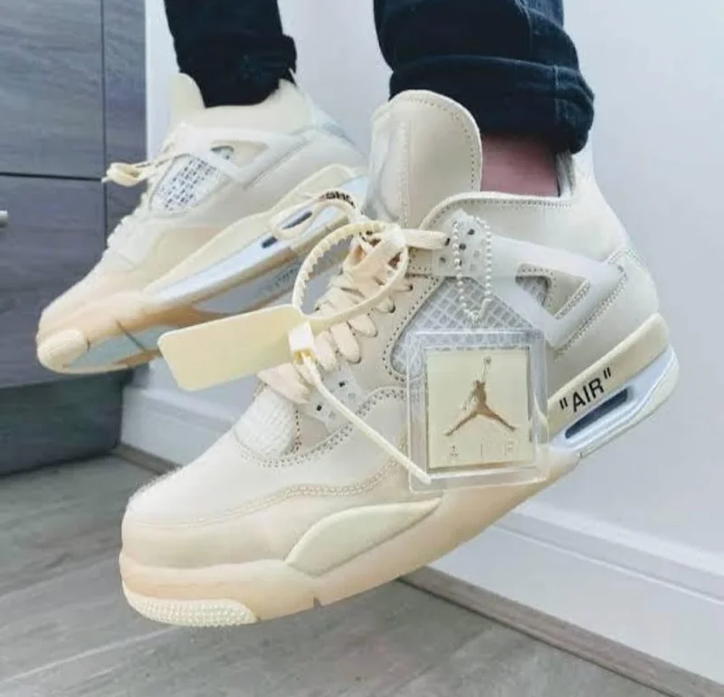 off-white_x_air_jordan_4_cream_sail_sneakers_2.webp