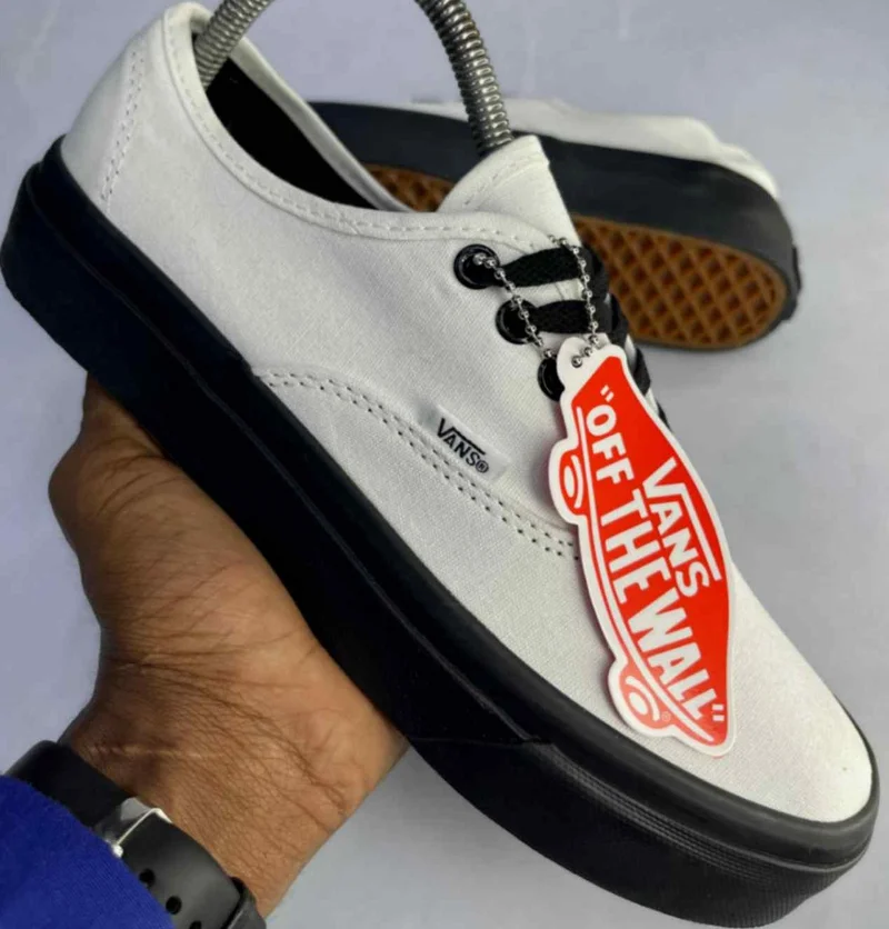 vans_authentic_white_canvas_shoes_-_black_sole_2.webp