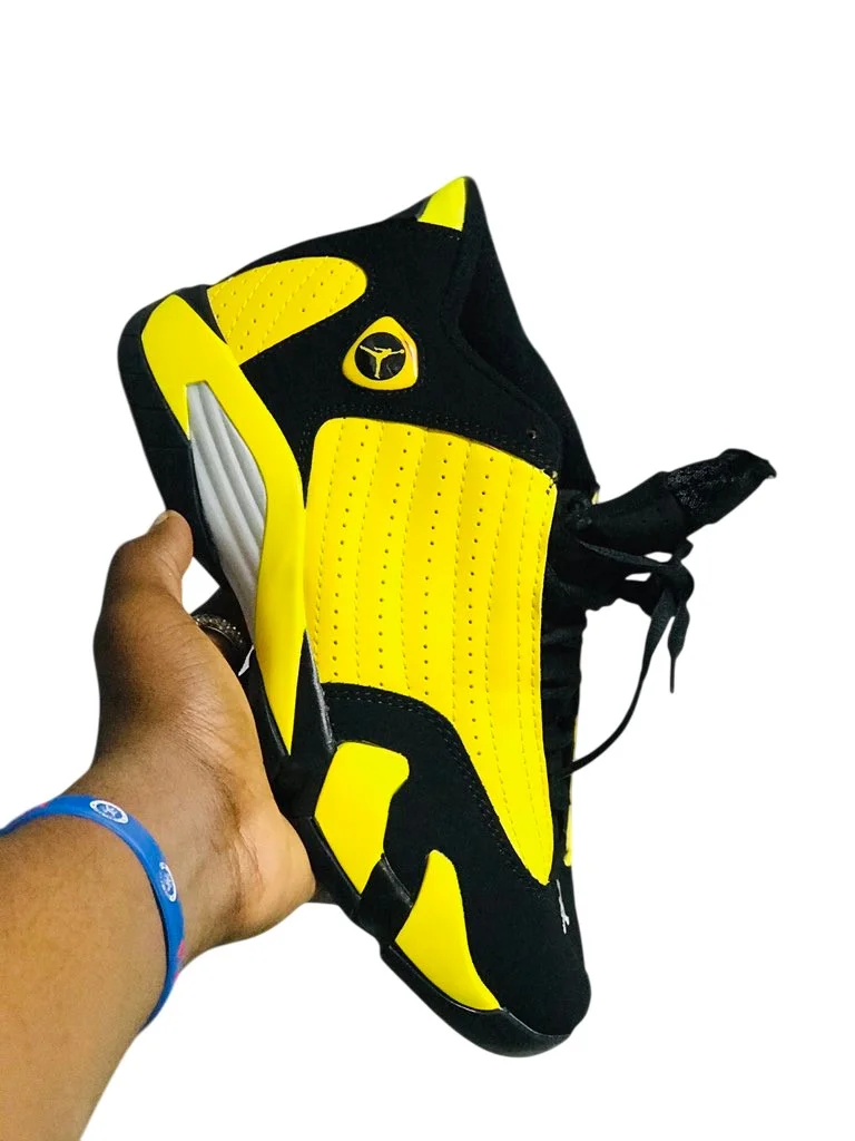 air_jordan_14_retro_thunder_black_vibrant_yellow-white_2.webp