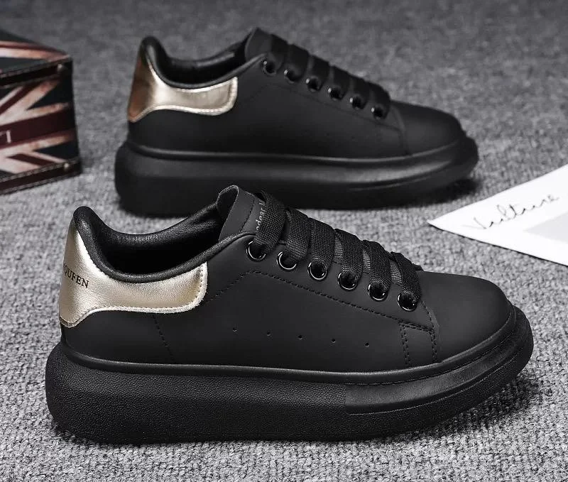 alexander_mcqueen_mens_show_leather_platform_black_gold_trainers_2.webp