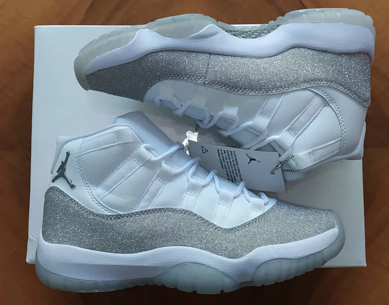 The Air Jordan 11 Grey/Silver Sneakers