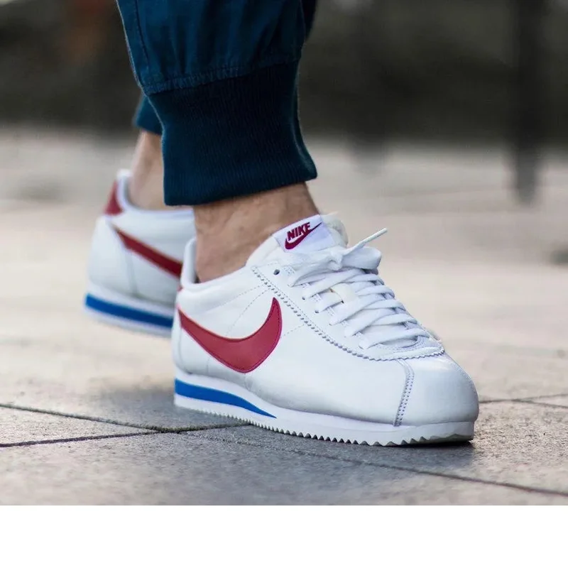 Nike Cortez leather sneakers in white with red swoosh