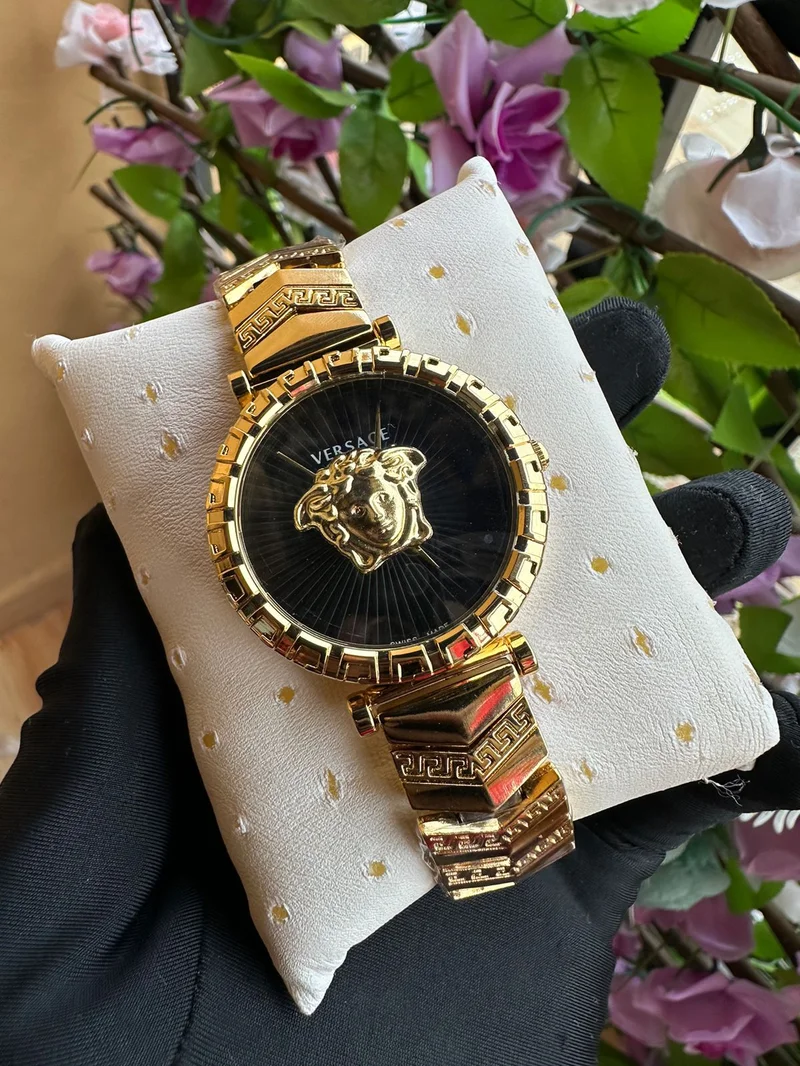 VERSACE GOLD WATCH WITH BLACK FACE LADIES WATCH