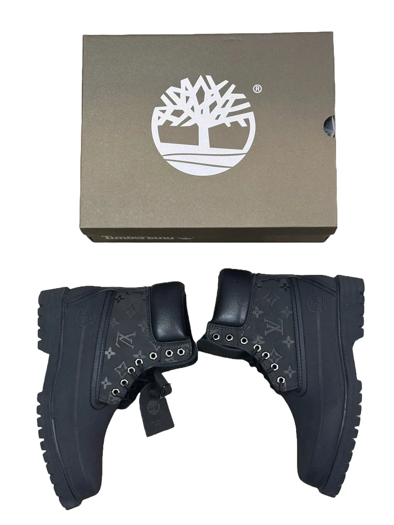 BLACK LOUIS VUITTON X TIMBERLAND BOOTS.